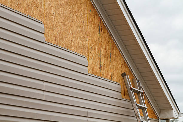 Professional Storm Damage Siding Repair technician working in Honey Grove, PA